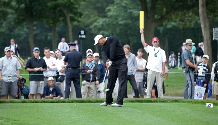 Tiger Woods hitting golf ball