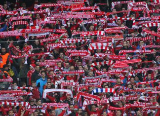 Bayern Munich to expand German presence with new retail and hospitality centre Fans of Bayern Munich holding up scarves