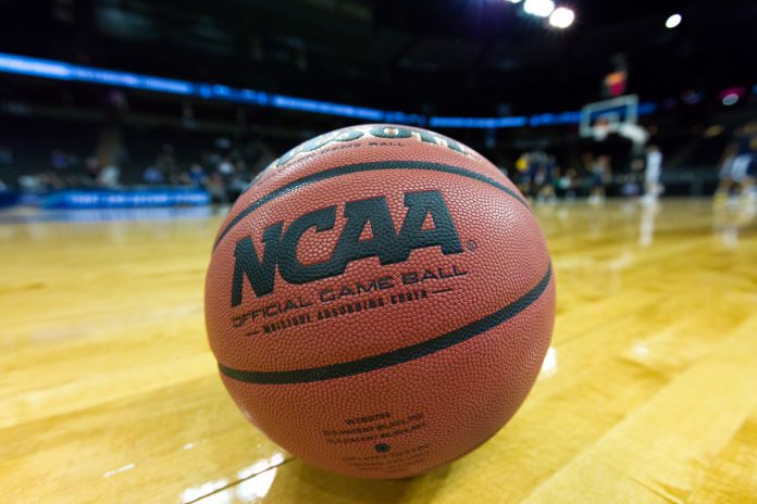 Basketball with NCAA logo.