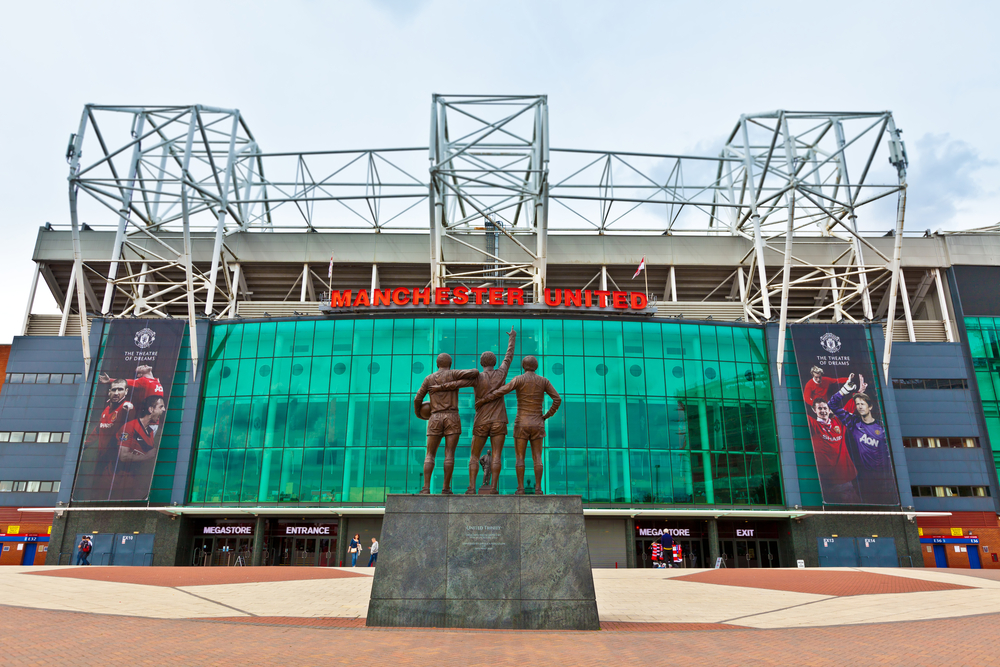The trilogy statue in front of Old Trafford.