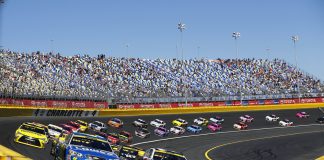 FOX Sports gears up to air NASCAR Esports series Nascar race taking place with cars on the bend in the track