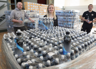Healthcare workers receive Irish FA water donation
