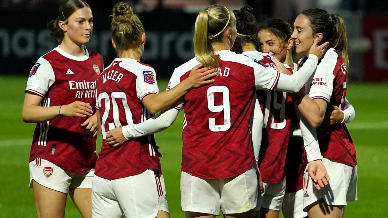 Arsenal women's team celebrating a goal.