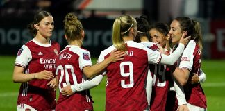 Arsenal breaks WSL attendance record with 60,160 Arsenal women's team celebrating a goal.