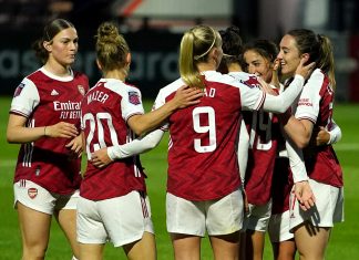 Arsenal breaks WSL attendance record with 60,160 Arsenal women's team celebrating a goal.
