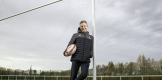 Rugby League World Cup 2021 selects £10m capital grant recipients Adam Hills poses at Warrington's Victoria Park