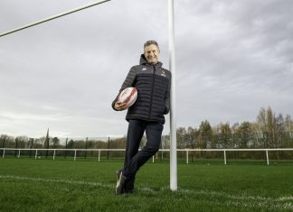 Rugby League World Cup 2021 selects £10m capital grant recipients Adam Hills poses at Warrington's Victoria Park