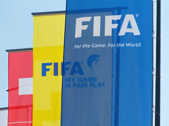 Flags hanging outside the FIFA headquarters in Zurich
