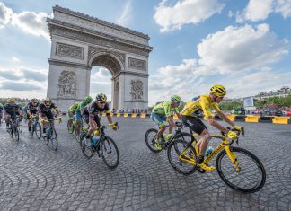 Orange introduces 5G network to Tour de France in renewed ASO partnership Cyclist Chris Froome passes by the Arc de Triomphe during Tour de France