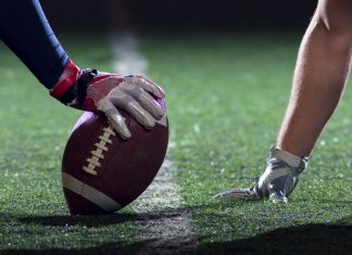 In-game betting will drive deeper engagement with US sports fans, says Sportradar’s Neale Deeley Close-up of an American football