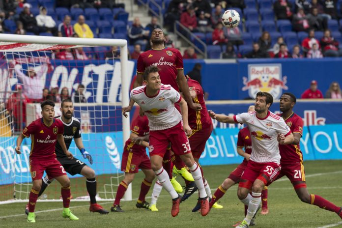Real Salt Lake players battle for the ball