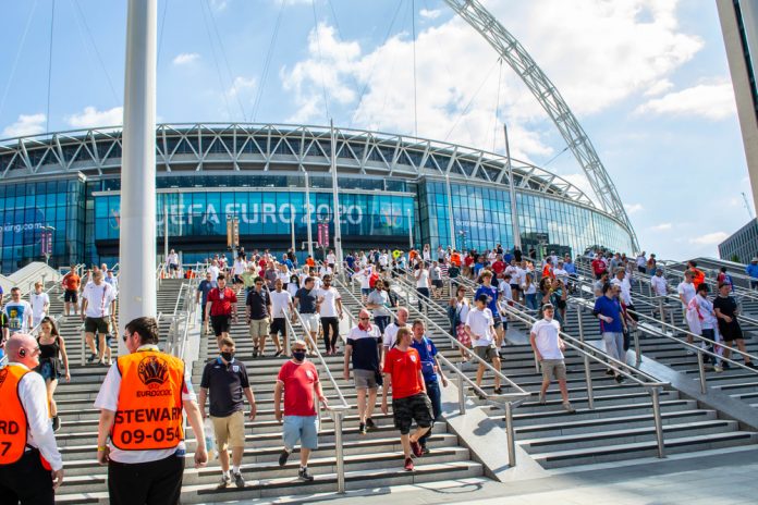 Fans walking outside of Wembley Stadium.