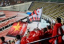 Japan eases attendance limits for professional sports