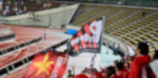Japan eases attendance limits for professional sports
