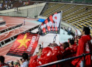 Japan eases attendance limits for professional sports