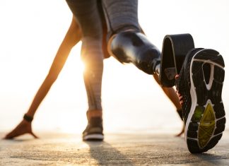 IPC highlights awareness, community and freedom in disability programme Woman starting to run.