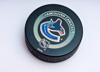 Vancouver Canucks secures TD Bank logo on home kits