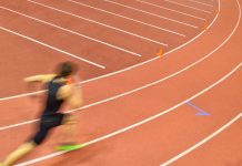 World Athletics and Infront ink a six-year media rights deal Man running round track.