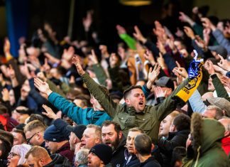 ‘This will protect the pyramid overall’ – Football Governance Bill passes second reading Fans singing at football game. FA Cup