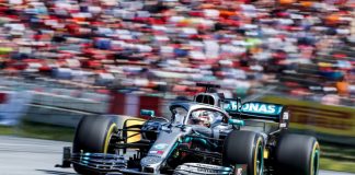 F1 makes Lenovo a global partner in latest sponsorship shakeup F1 car driving on track.