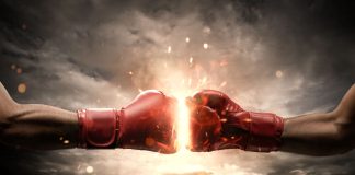 Boxing fans raise questions over DAZN and WBC deal Two boxing gloves punching each other.
