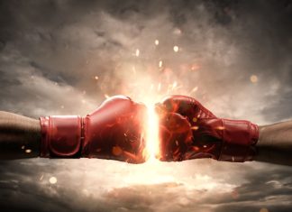 Boxing fans raise questions over DAZN and WBC deal Two boxing gloves punching each other.