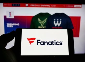 Fanatics renews contract with the Cleveland Browns Person holding a phone with the Fanatics logo in front of the company's website.