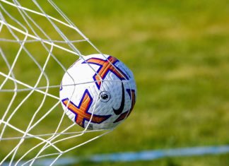 Home nations to offer coaching programmes in partnership with Chase Ball hitting the back of a football net.