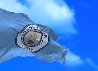 Jack Grealish stars in crypto-sport ‘my fabric’ OKX campaign Flag of Manchester City in wind.