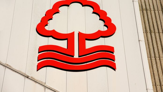 Nottingham Forest badge on building.