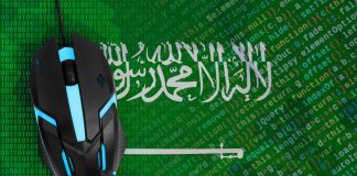 IOC leverages Saudi expertise for Olympic Esports Games Computer mouse on KSA flag.
