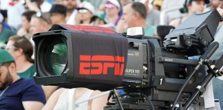 ESPN Bet’s swinging for golf exposure with PGA Tour streaming deal Broadcast camera at a sports match with ESPN branding.