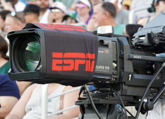 ESPN Bet’s swinging for golf exposure with PGA Tour streaming deal Broadcast camera at a sports match with ESPN branding.