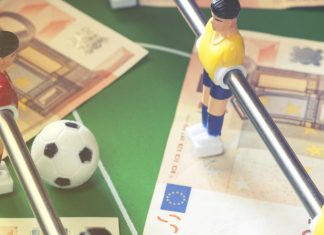 IBIA: Football and tennis responsible for most suspicious bets in Q3 2023 Euro notes on a foosball table.