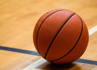 Betting scheme allegedly fixes NCAA and CBA basketball games Basketball on the floor.