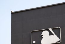 MLB and Mercedes F1 named in two fraud lawsuits against crypto firm FTX Image of the MLB logo on the side of a building