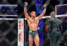 PFL strikes partnership with 888poker ahead of fighters’ Dublin conquest PFL fighter raising his arms in celebration.
