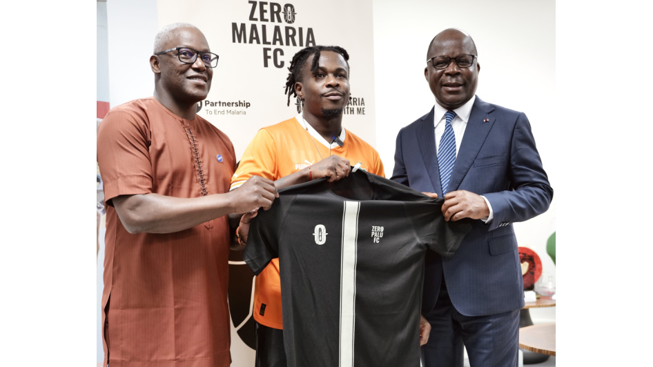 Holding No Malaria FC shirt