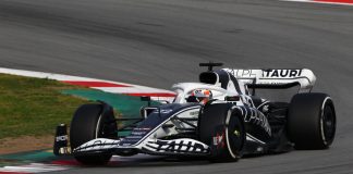 F1’s AlphaTauri confirms new team name ahead of 2024 campaign AlphaTauri F1 car racing round a corner