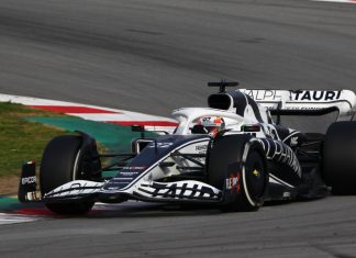 F1’s AlphaTauri confirms new team name ahead of 2024 campaign AlphaTauri F1 car racing round a corner