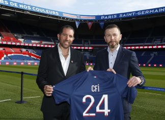 PSG announces trading partnership with CFI PSG and CFI holding up a football shirt to signify their new deal.