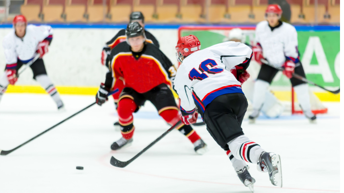 Women playing ice hockey