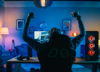 Odin.gg extends ties with PGL to enhance esports experiences Backshot of a gamer celebrating.