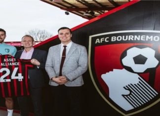 AFC Bournemouth signs partnership with Asset Alliance Group AFC Bournemouth and Asset Alliance Group holding up football kit to signify their new deal.