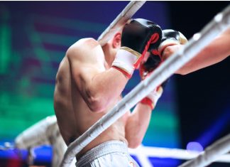 Checkd Dev launches “one-stop-shop” Boxing News app Boxer defending himself on the ropes.