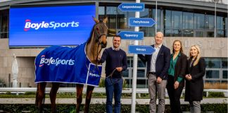 Vlad Kaltenieks: Cementing BoyleSports’ legacy via Ireland’s greatest race BoyleSports' representatives standing with a horse in a branded cover.