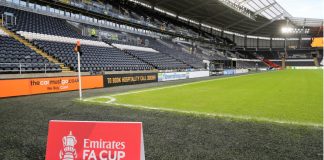 FA and Premier League unveil huge format changes to FA Cup A sign that says "Emirates FA Cup" on the pitch at Hull.