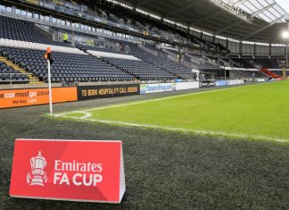 FA and Premier League unveil huge format changes to FA Cup A sign that says "Emirates FA Cup" on the pitch at Hull.
