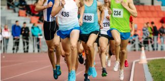 UKA unveils private venture to alleviate financial woes Group of male athletes running in a group round a track.