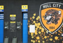 Hull City reveals ‘landmark’ sponsorship agreement Hull City badge painted on wall of KCom stadium.